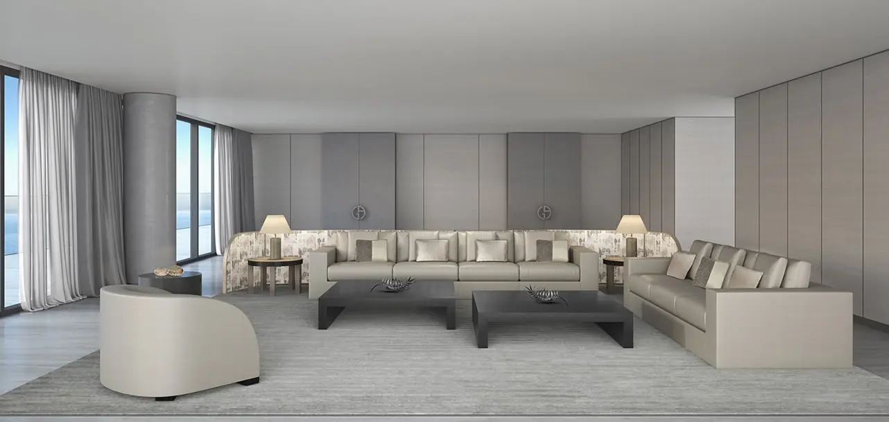Armani/Casa-designed living room with the GA monogram on wall panels — Armani Beach Residences, Palm Jumeirah