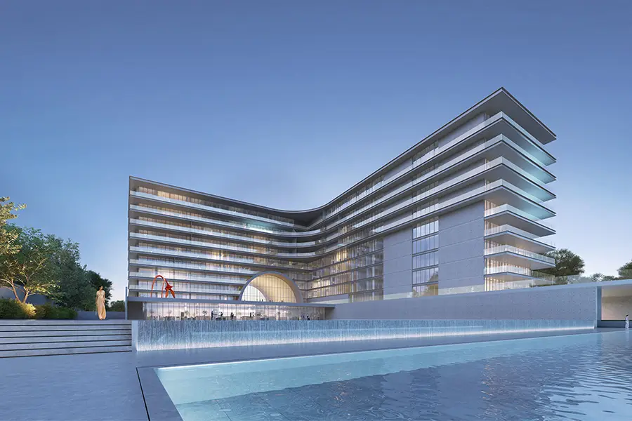 Armani Beach Residences at dusk, wave-form façade and infinity pool, Palm Jumeirah