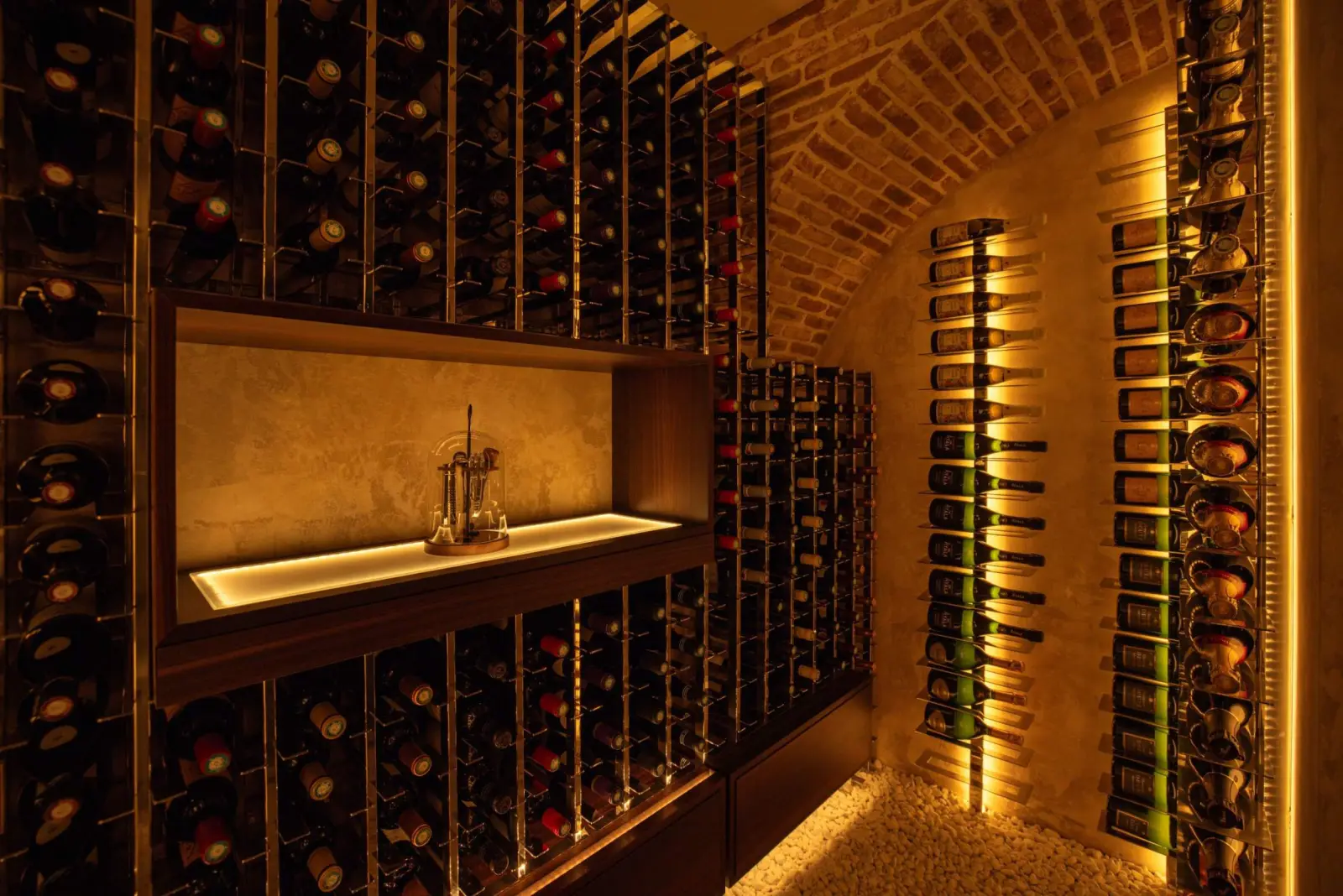 The vaulted brick wine cellar of Maison Bauchart