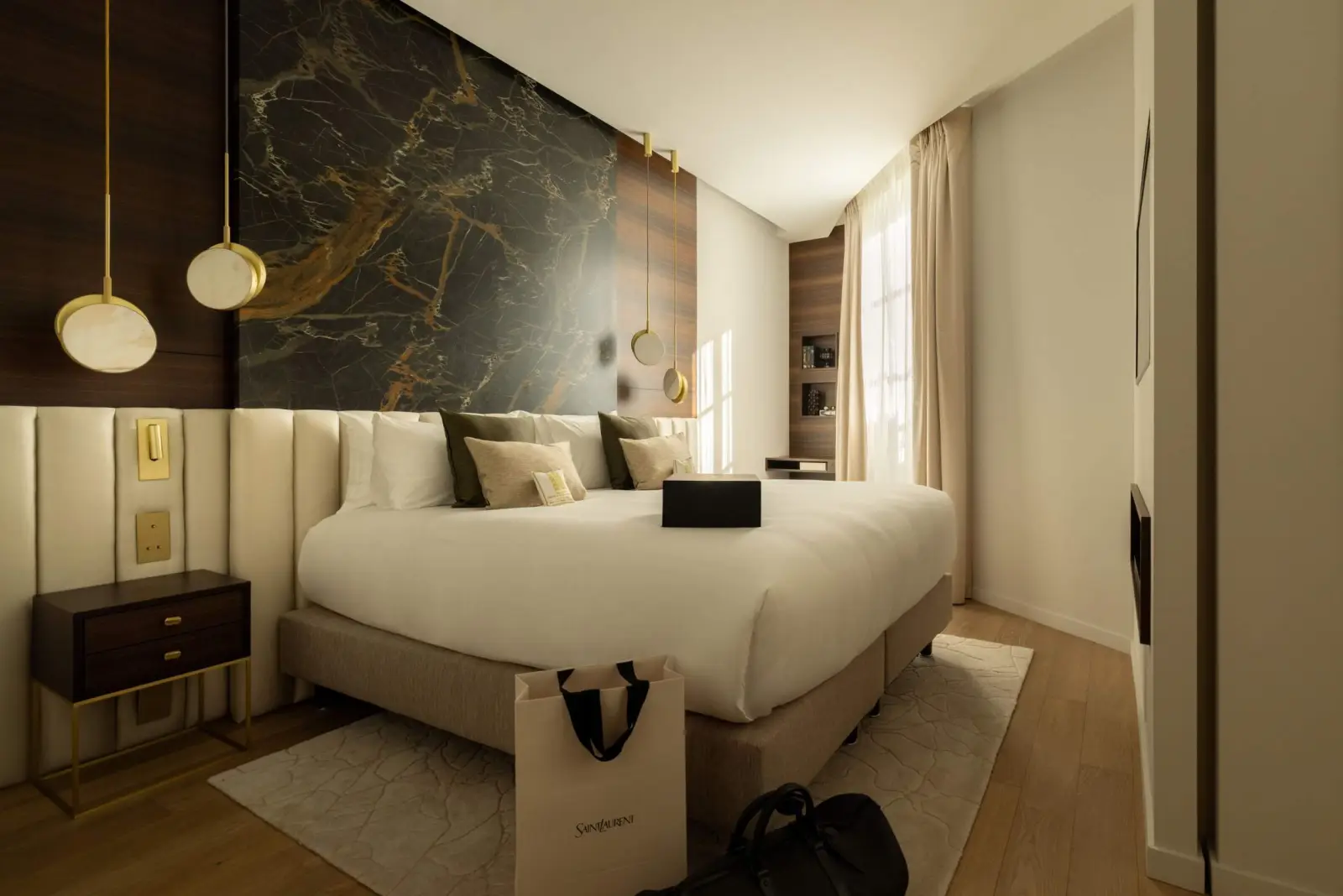 Bauchart Duplex Loft, the bedroom, black marble and gold — Maison Bauchart, Paris 8th