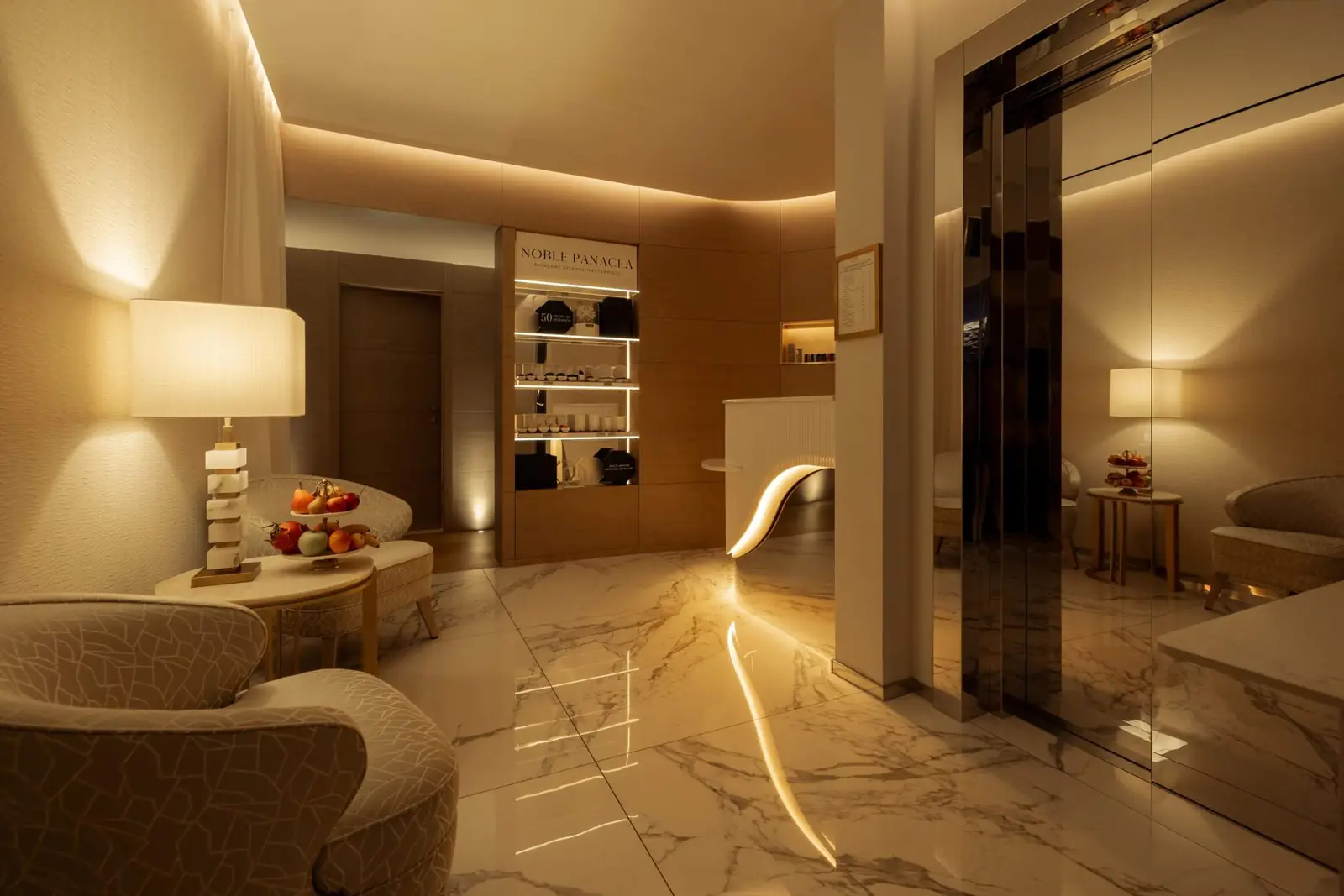 Spa reception with marble floor and waiting lounge — Maison Bauchart