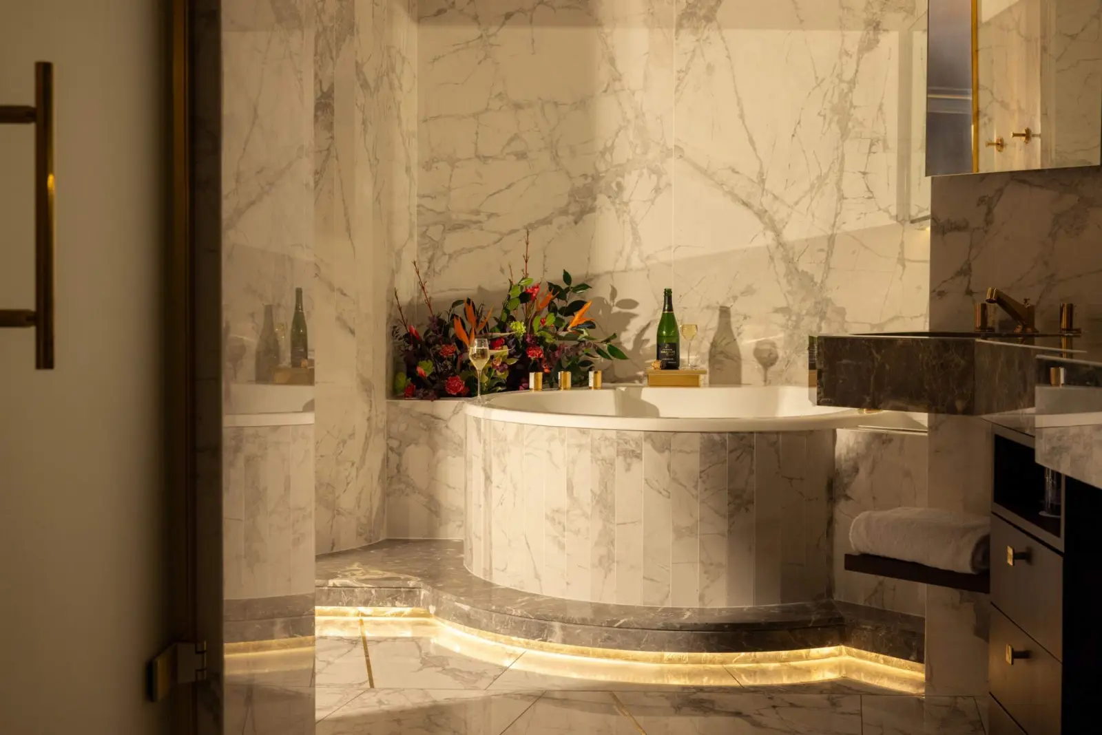 Alma Suite, the semi-open bathroom and round bath — Maison Bauchart, Paris 8th