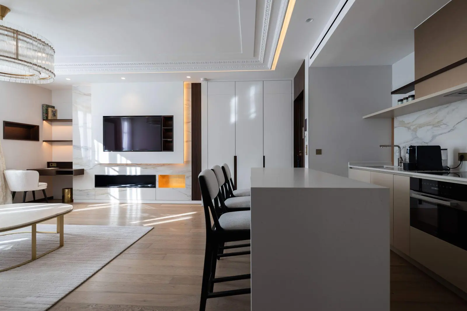 Marceau Suite, the living area and island kitchen — Maison Bauchart, Paris 8th