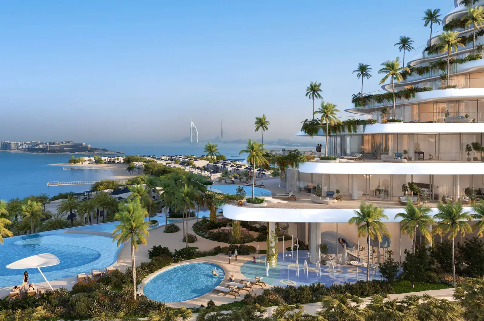 Amenity floor with pools and a view of Burj Al Arab from Como Residences, Palm Jumeirah