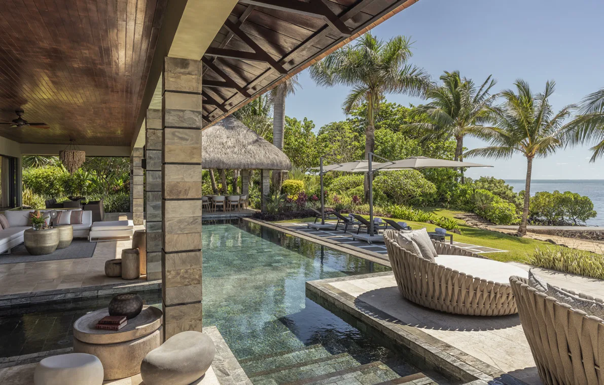 Terrace and pool of a renovated Four Seasons villa at Anahita