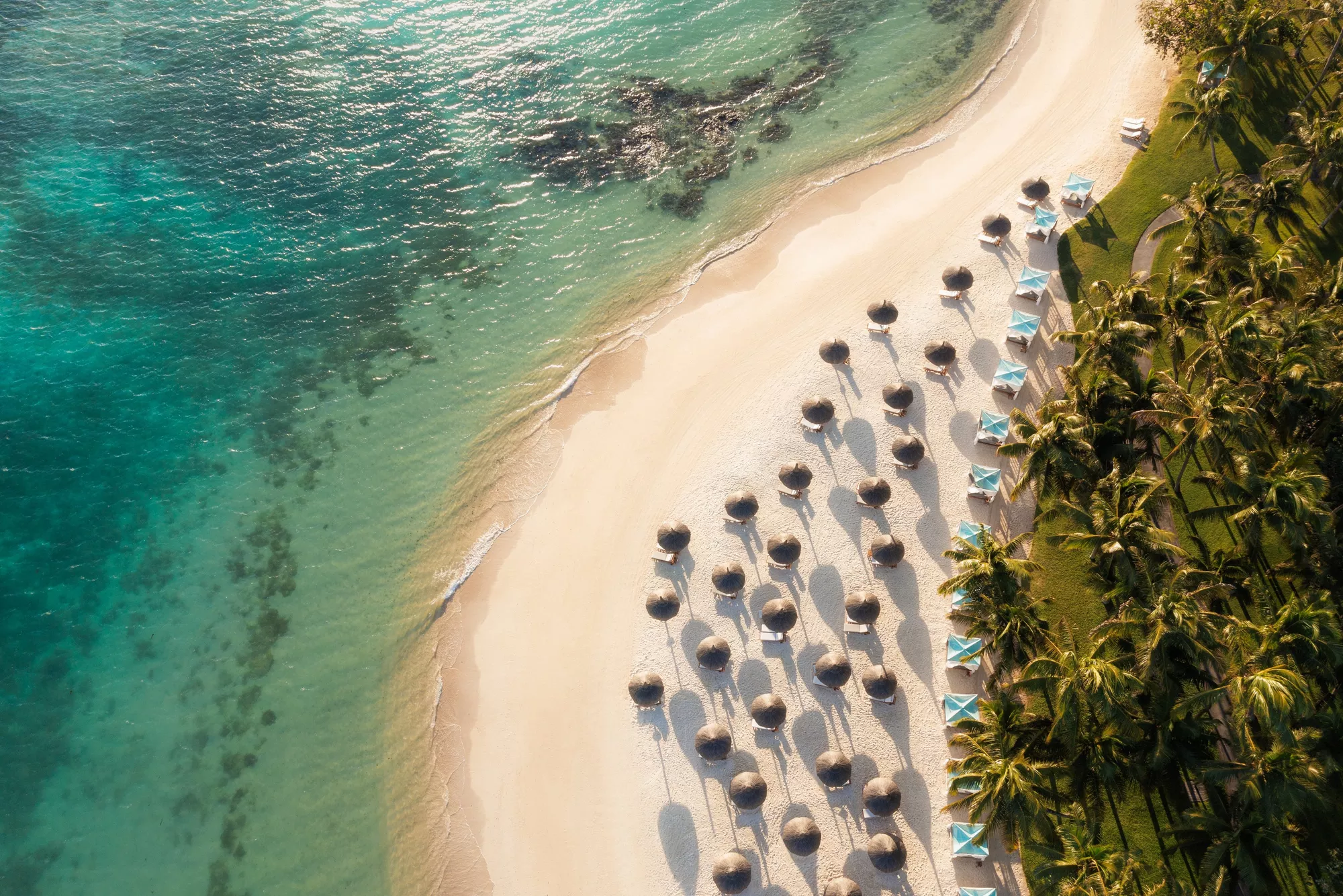 Aerial view of the One&Only Le Saint Géran peninsula, between ocean and lagoon, east coast of Mauritius