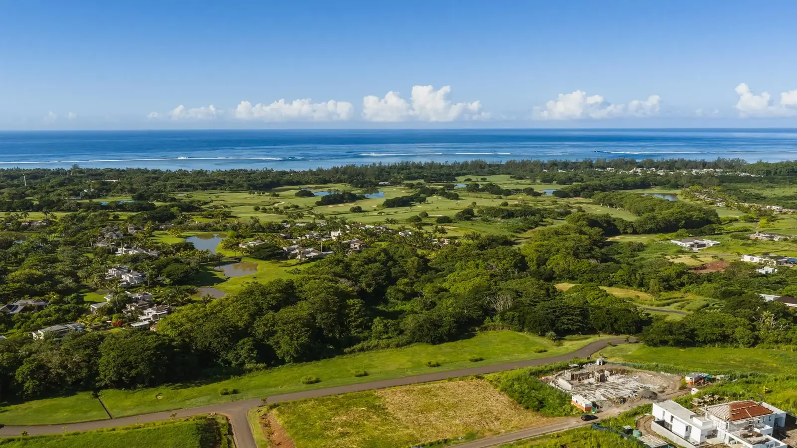 Aerial view of the Bel Ombre estate between mountain and ocean, Mauritius