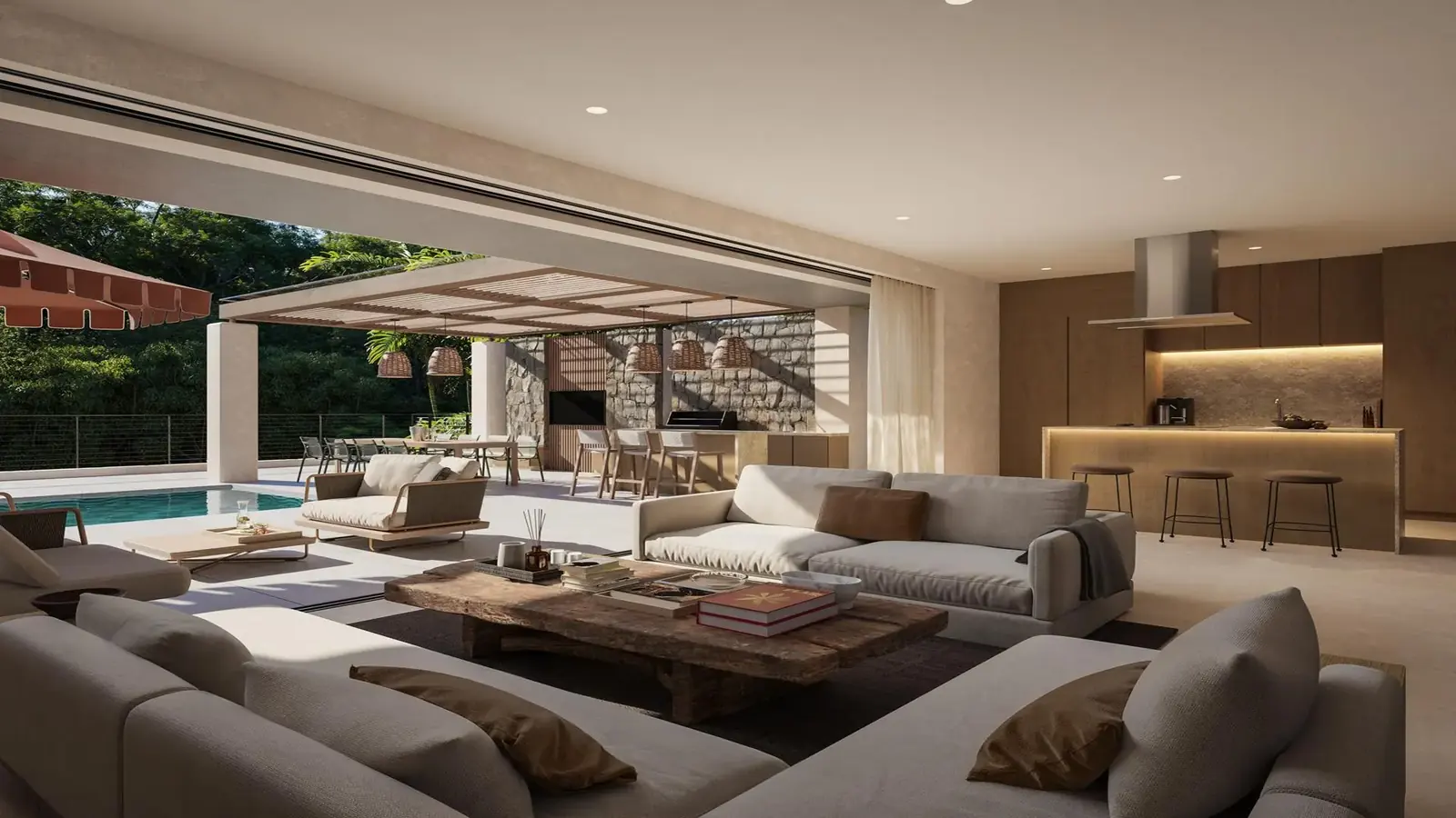 Open living room and kitchen of a villa designed by YOO Studio, Bel Ombre