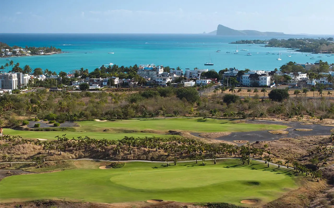 Turquoise Mont Choisy beach and lagoon facing Coin de Mire, north coast of Mauritius