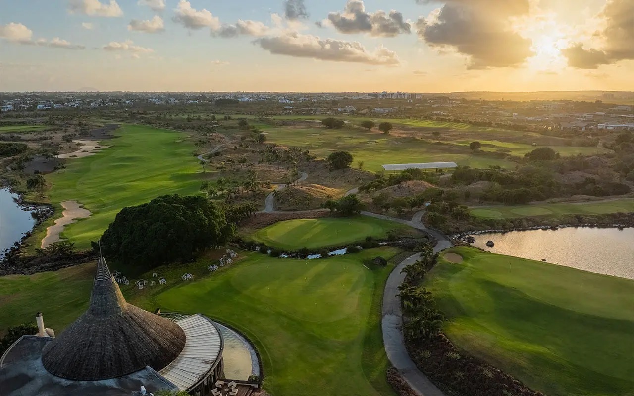 Sunset over the golf course and clubhouse at Mont Choisy, Grand Baie, Mauritius