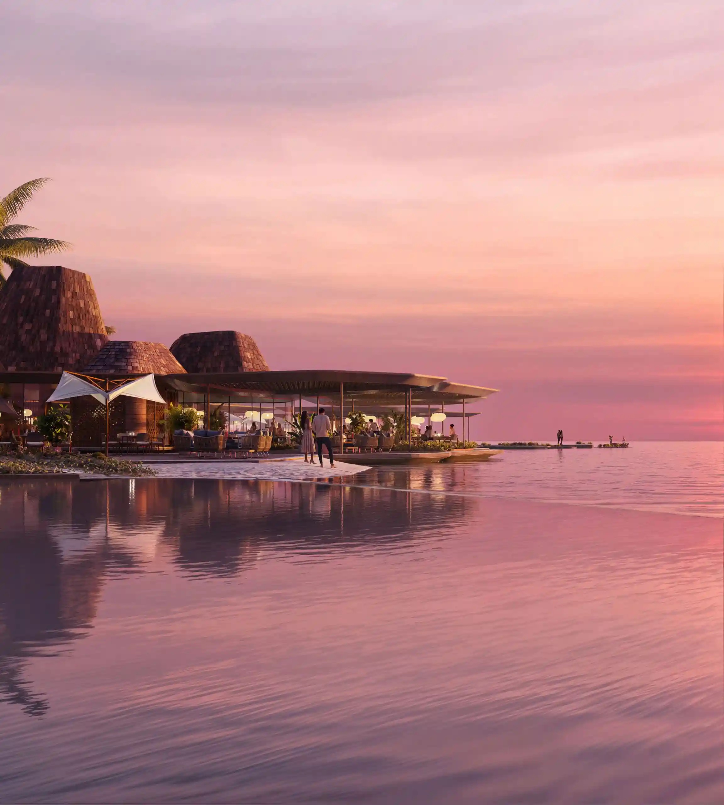 Baccarat Maldives — oceanfront signature fine-dining restaurant at dusk